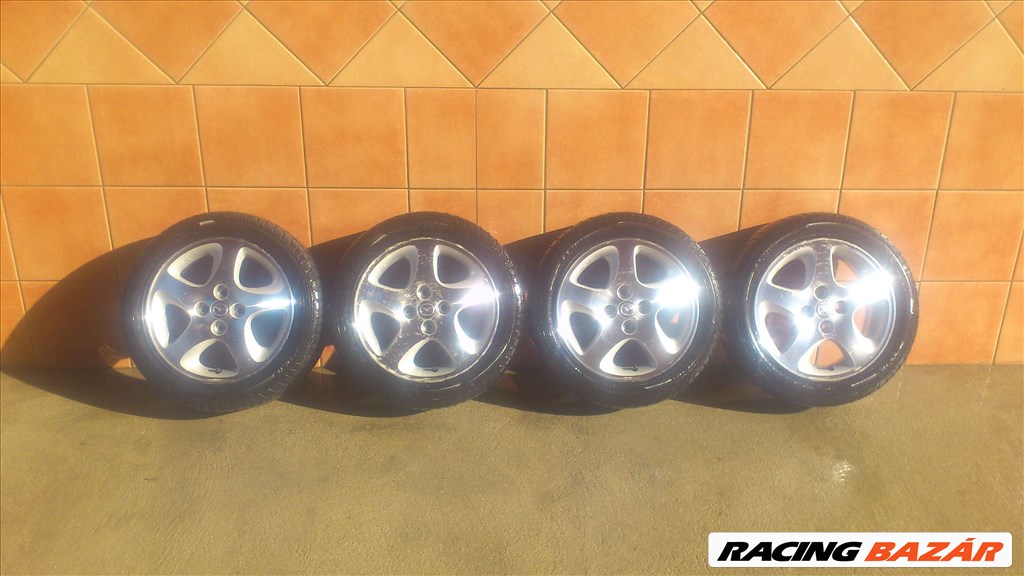 MAZDA 15" ALUFELNI 4x100 NYÁRI 195/50R15 GUMIVAL OLCSÓN!!!!!!!!!! 1. kép