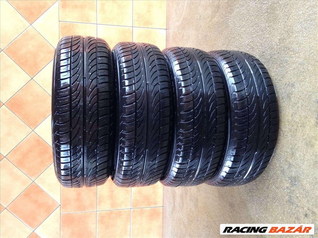 NISSAN 14" ALUFELNI 4x100 NYÁRI 185/65R14 GUMIVAL OLCSÓN!!!! 5. kép