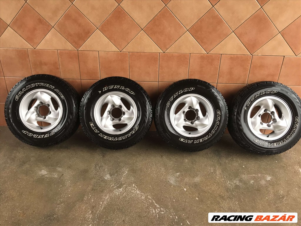 TEREPJÁRÓ 15" ALUFELNI 6X139,7 NÉGYÉVSZAKOS 235/75R15 GUMIVAL OLCSÓN!!!! 1. kép