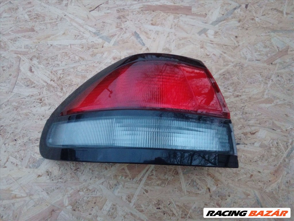  Mazda 626 GF/GW Bal hátsó lámpa Koito 22061825 1. kép