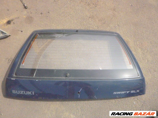 Suzuki Swift 99,, 5 ajtós kék csomagtérajtó üveg nélkül! 1. kép