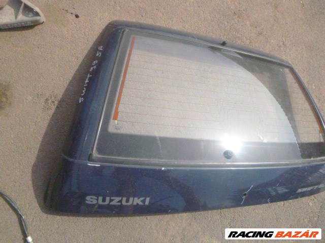 Suzuki Swift 99,, 5 ajtós kék csomagtérajtó üveg nélkül! 2. kép