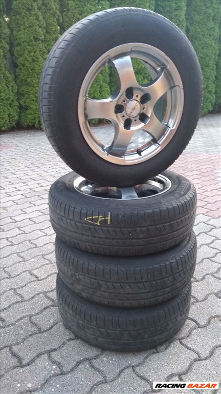 Opelre való Dezent alufelni 15" 5x110 lyukosztású,rajta 195/65 Pirelli nyári gumi  2. kép
