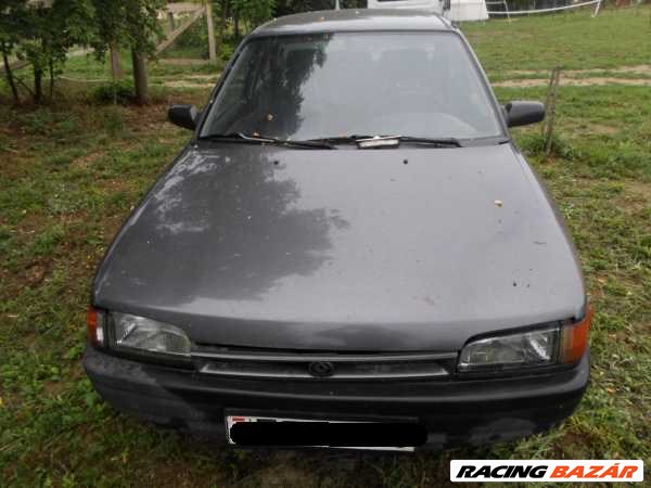 MAZDA 323 -94 Bal fényszóró alatti bajusz díszléc 1. kép