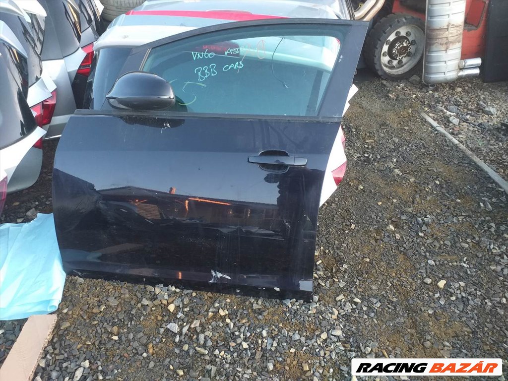 Opel Astra J bal első ajtó Fekete 1. kép