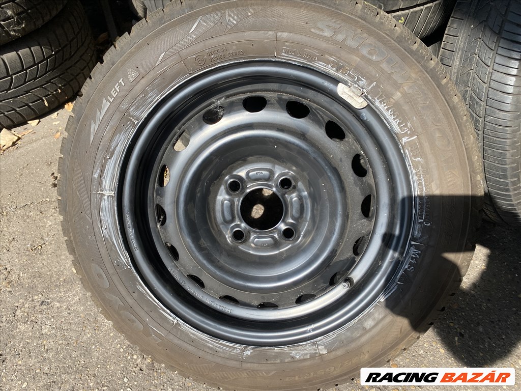 Nissan Micra gyári 5,5X14" 4X100 ET45 lemezfelni garnitura eladó téligumival 4. kép