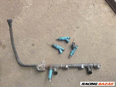 Toyota Yaris (XP10) 1.0 injektor híd 23250-23020  HENGERENKÉNTI BEFECSKENDEZŐK  2325023020