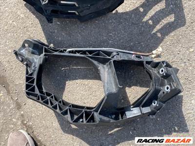 Mitsubishi Colt VI MITSUBISHI COLT Bal Fényszóró Tartó 