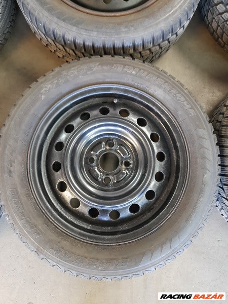 Toyota 4x100-as 15" használt (gyári felni) lemezfelni, 195/60 újszerű Bridgestone téli gumi Sxx3 2. kép