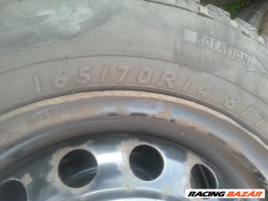 4x100 14" gyári Nissan Micra használt lemezfelni, rajta 165/70 Dunlop téli gumi  6. kép