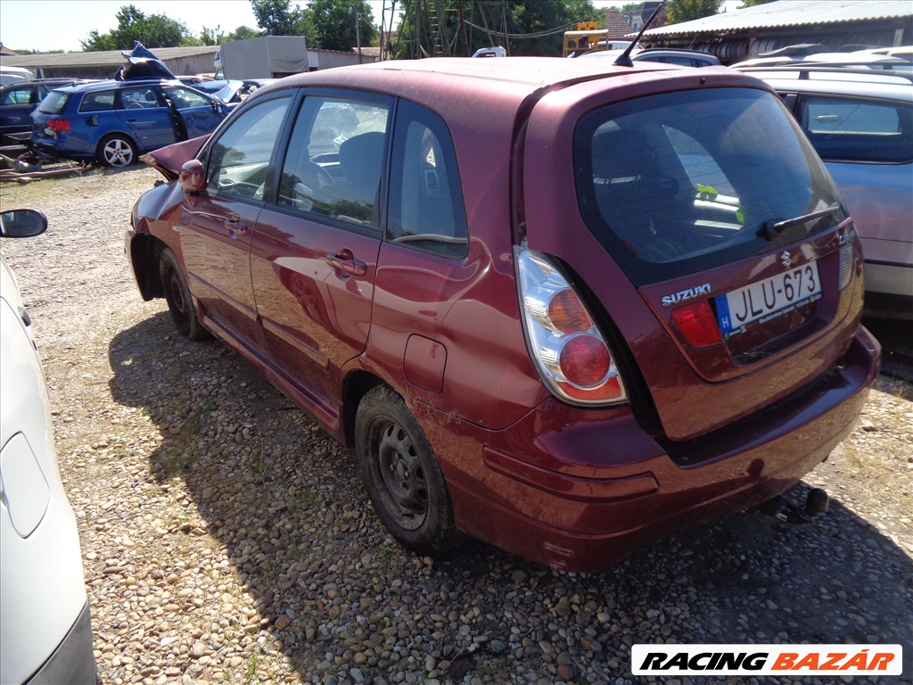 Suzuki Liana bontott alkatrészei M13A MOTOR VÁLTÓ FÉLTENGELY LÁMPA BÖLCSŐ AJTÓ KORMÁNYMŰ 4. kép