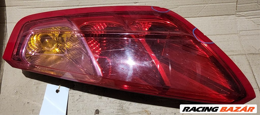 162396 Fiat Grande Punto jobb hátsó lámpa a képen látható sérüléssel 51701590 1. kép