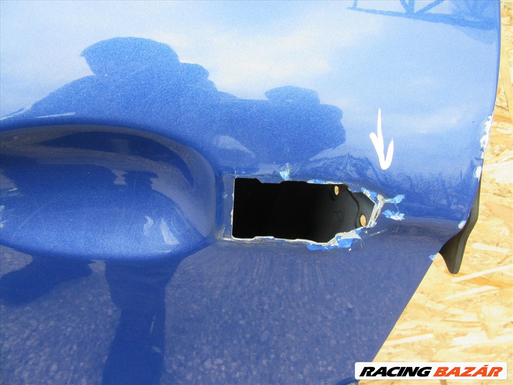 52049 Alfa Romeo Gt kék színű, bal oldali ajtó a képen látható sérüléssel 2. kép