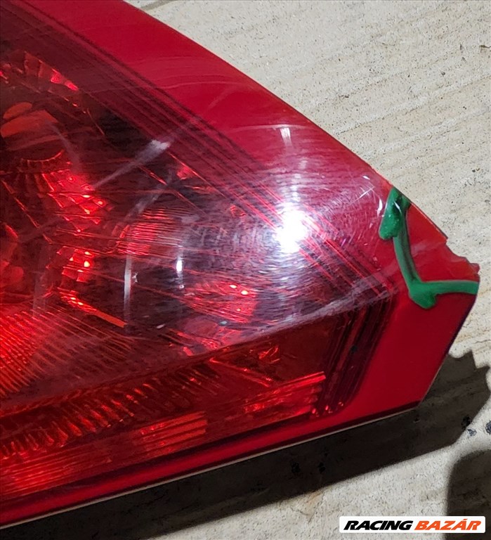 162395 Fiat Grande Punto jobb hátsó lámpa a képen látható sérüléssel 51701590 2. kép