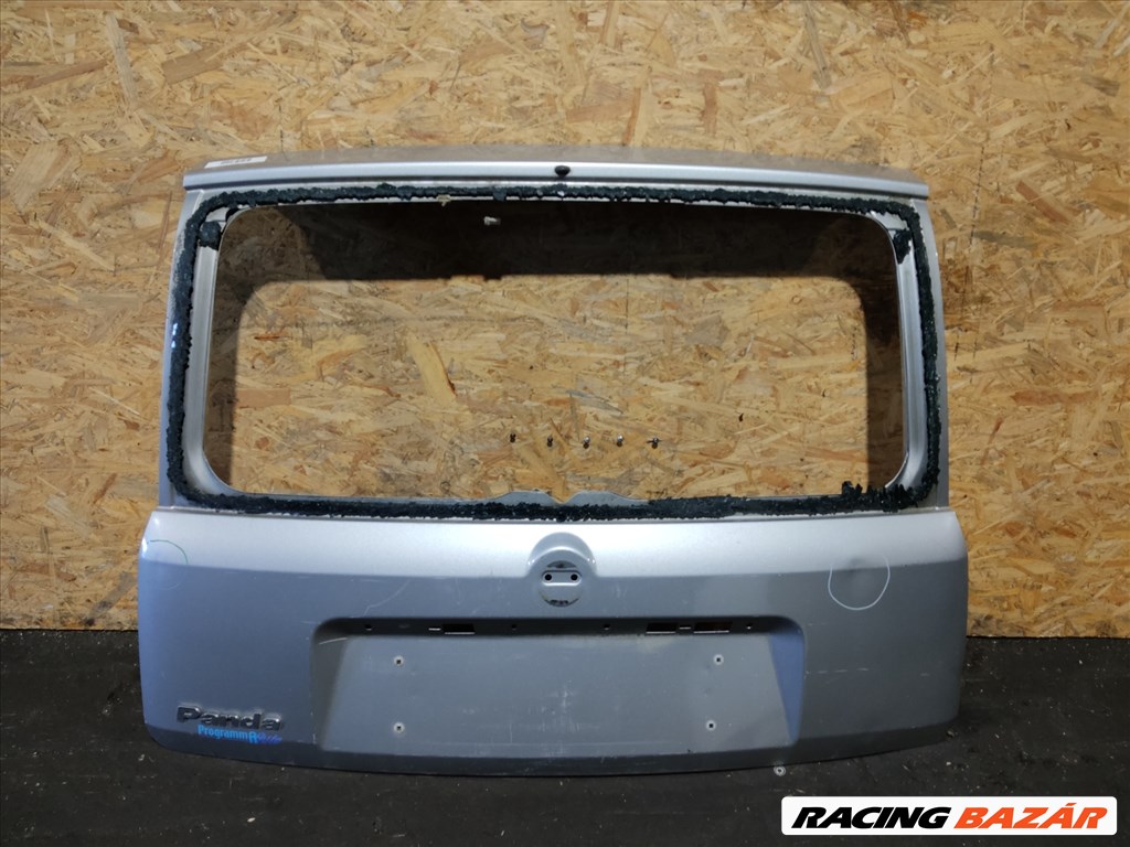 157654 Fiat Panda II. 2003-2012 szürke színű csomagtérajtó, a képen látható sérüléssel, üveg nélkül!! 1. kép