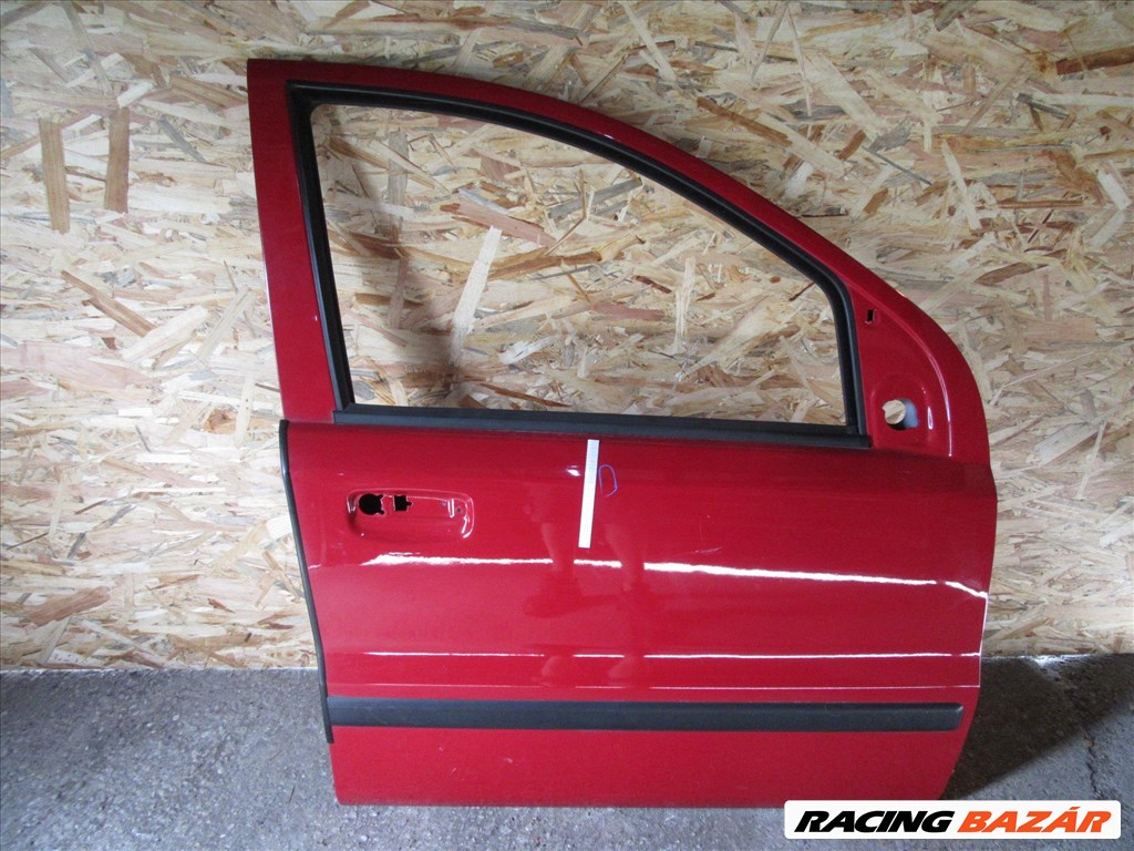 Ajtó36041 Fiat Panda II. piros színű, jobb első ajtó a képen látható sérüléssel 1. kép