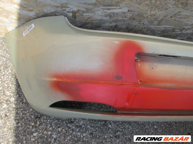 94099 Fiat Grande Punto hátsó lökhárító, a képen látható sérüléssel  71777606 3. kép