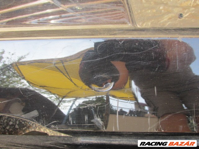 94127 Fiat Grande Punto fekete színű hátsó lökhárító, a képen látható sérüléssel 71777606 4. kép