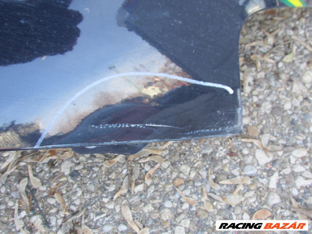 77198 Fiat Stilo 5 ajtós sötétkék színű, jobb első sárvédő a képen látható sérüléssel 3. kép