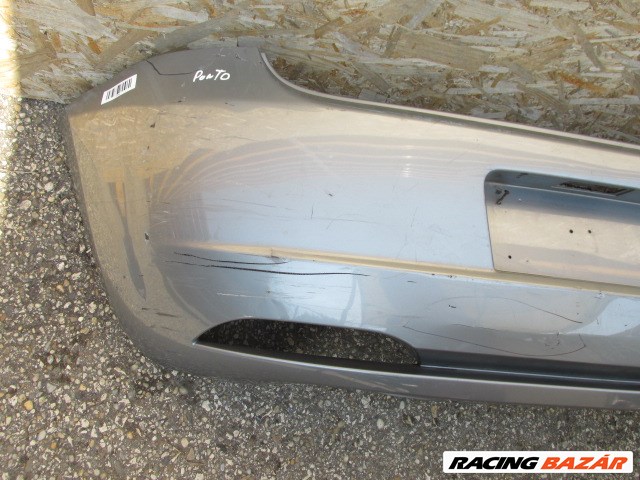 94104 Fiat Grande Punto ezüst színű hátsó lökhárító, a képen látható sérüléssel  71777606 3. kép