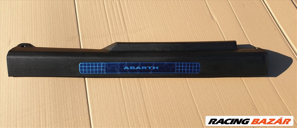 Abarth Grande Punto gyári új bal küszöb belső borítás 735459190 1. kép