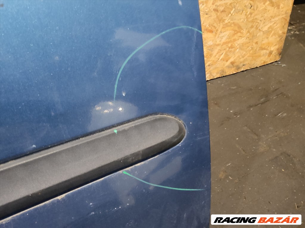 157544 Fiat Doblo 2000-2009 kék színű jobb első ajtó a képen látható sérüléssel 3. kép