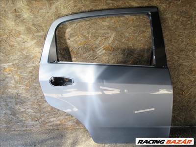 Ajtó29016 Fiat Grande Punto/Punto Evo 5 ajtós, világos kék színű, jobb hátsó ajtó a képen látható sérüléssel
