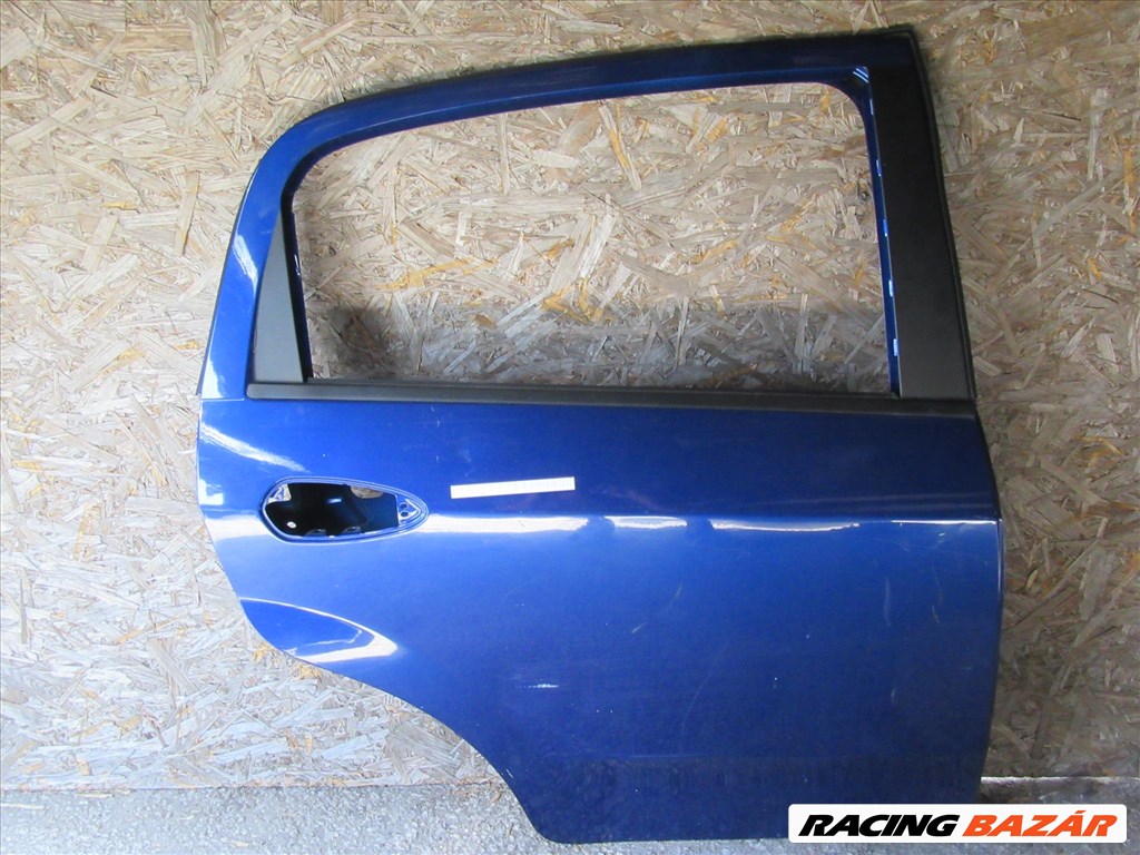 Ajtó29009 Fiat Grande Punto/Punto Evo 5 ajtós, kék színű,jobb hátsó ajtó a képen látható sérüléssel 1. kép