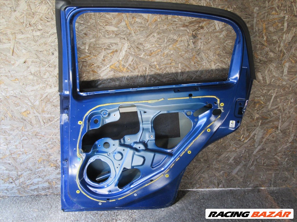 Ajtó29009 Fiat Grande Punto/Punto Evo 5 ajtós, kék színű,jobb hátsó ajtó a képen látható sérüléssel 3. kép
