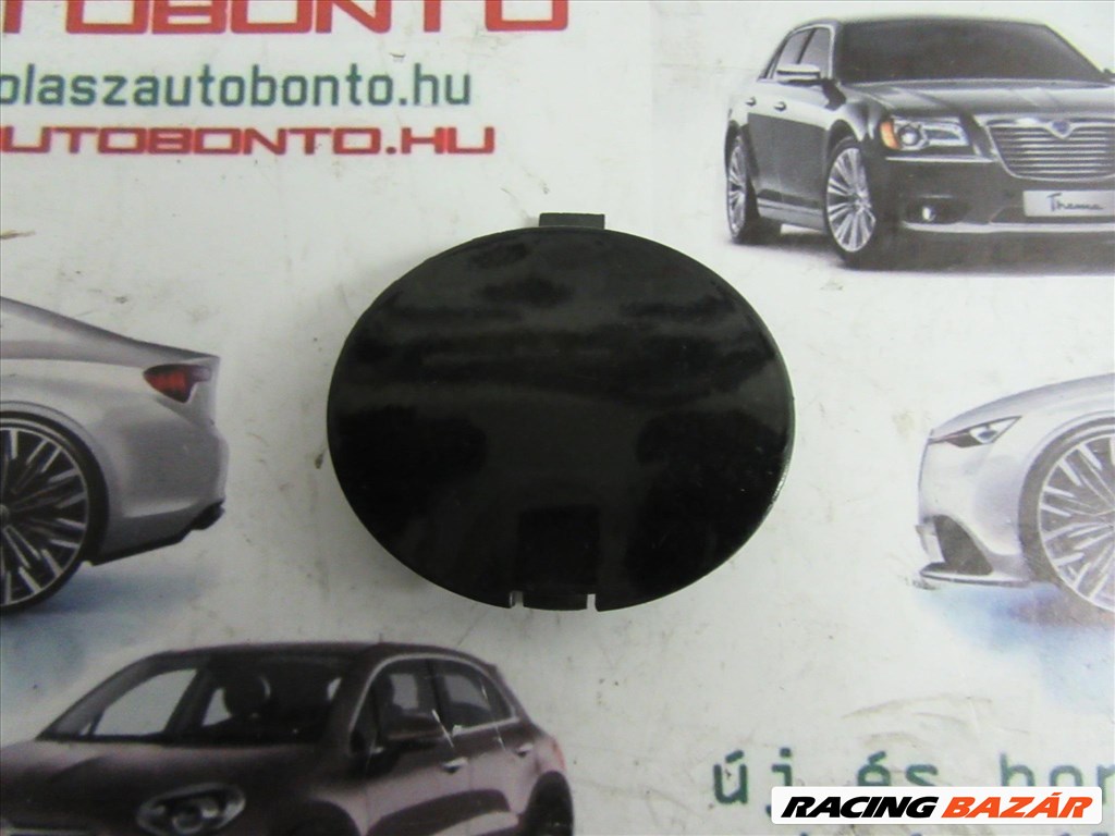 Fiat Punto Evo 735500129 számú, fekete színű, első vonószem takaró 1. kép