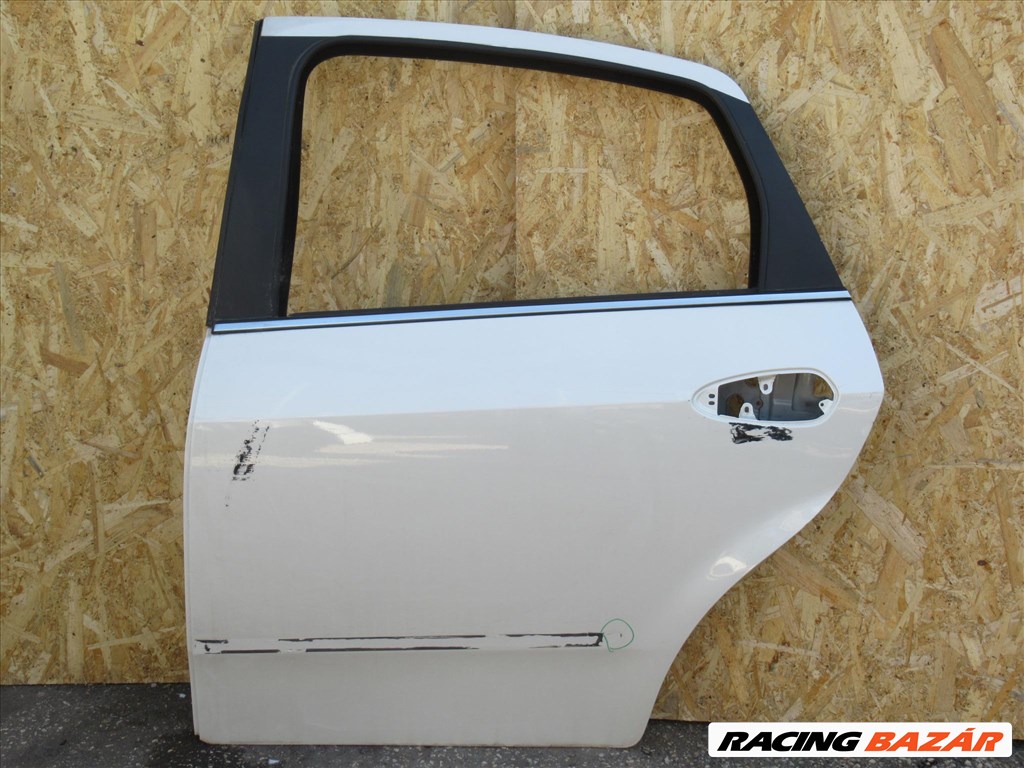 111100 Fiat Linea bal hátsó ajtó a képen látható sérüléssel  1. kép