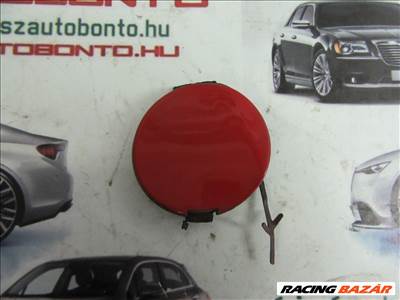 Fiat Punto Evo 735536156 számú, piros színű, első vonószem takaró