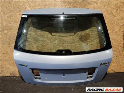 157610 Fiat Stilo  2001-2003 5 ajtós világoskék színű csomagtérajtó, a képen látható sérüléssel