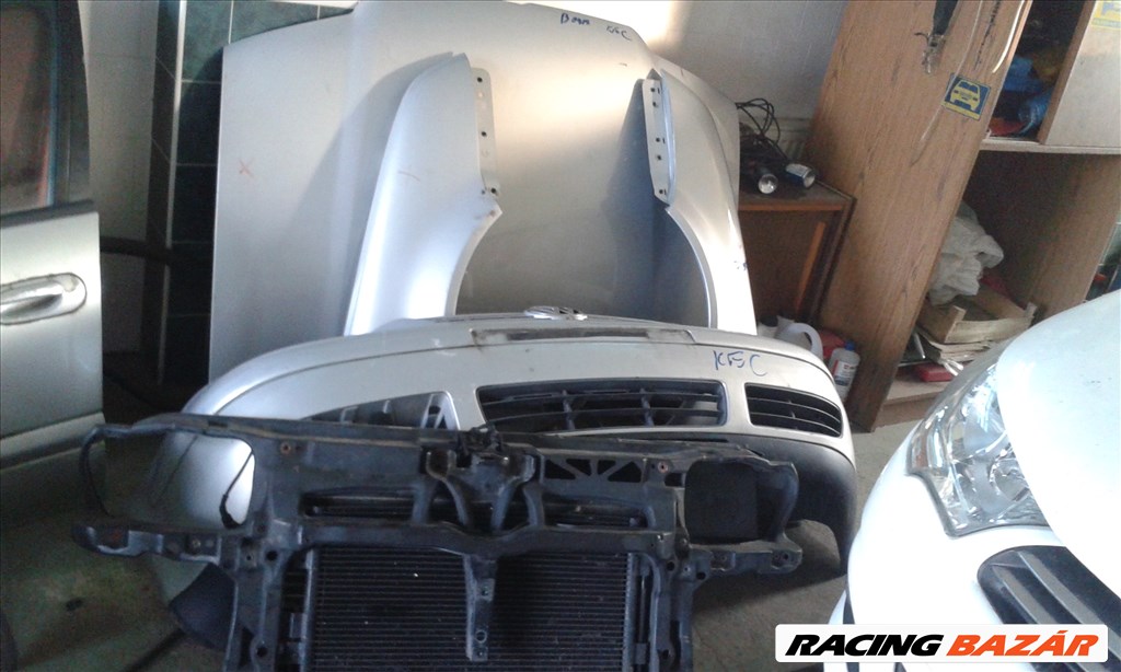 Volkswagen Bora 1998-2004 hátsó lökhárító, homlokfal, ajtó, lámpa, csomagtérfedél 1. kép