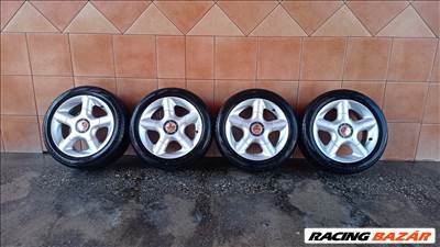 FUNDMETAL 15" ALUFELNI 4X100 NYÁRI 195/50R15 GUMIVAL OLCSÒN!!!