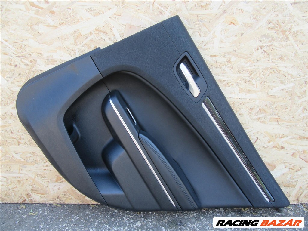  Kárpit53722 Lancia Thema fekete színű, bőr, jobb hátsó ajtókárpit 1. kép
