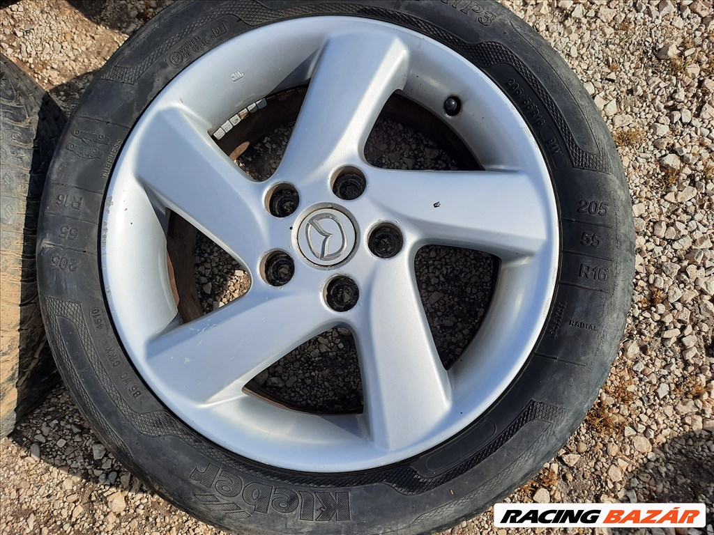 16-os MAZDA 6  . 5x114,3  . 7Jx16  . Et55  használt gyári  alufelni, rajta kopott nyári gumi  2. kép