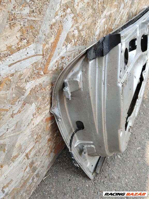 168709 Fiat Barchetta 1995-2004 ezüst színű jobb oldali ajtó, a képen látható sérüléssel 2. kép