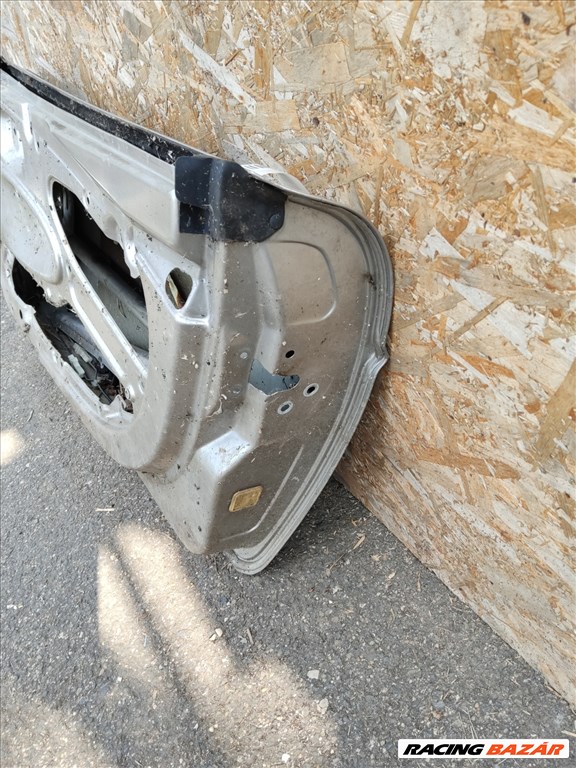 168709 Fiat Barchetta 1995-2004 ezüst színű jobb oldali ajtó, a képen látható sérüléssel 4. kép