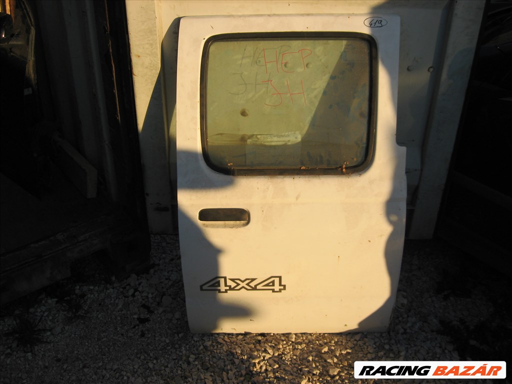 419. Nissan Navara D22 / D25 jobb hátsó ajtó  1. kép