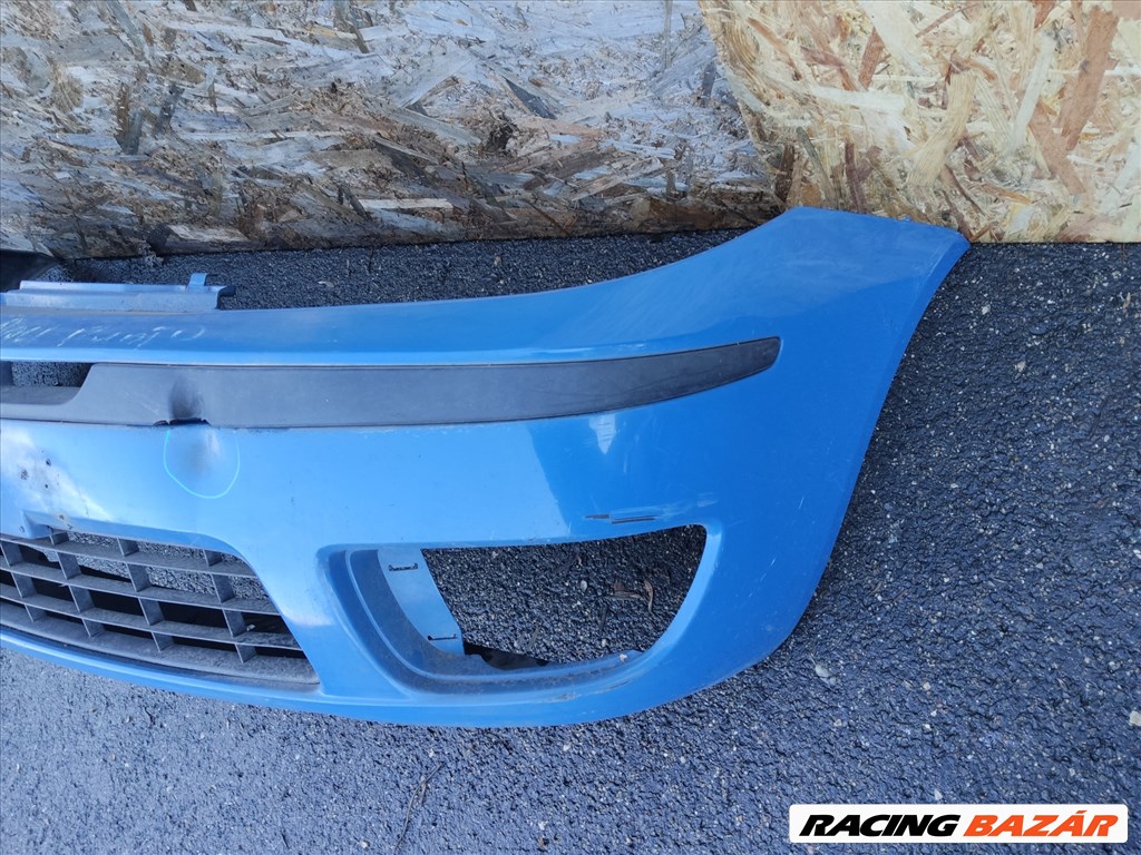 172969 Fiat Punto III. 2003-2010 kék színű első lökhárító, a képen látható sérüléssel 4. kép