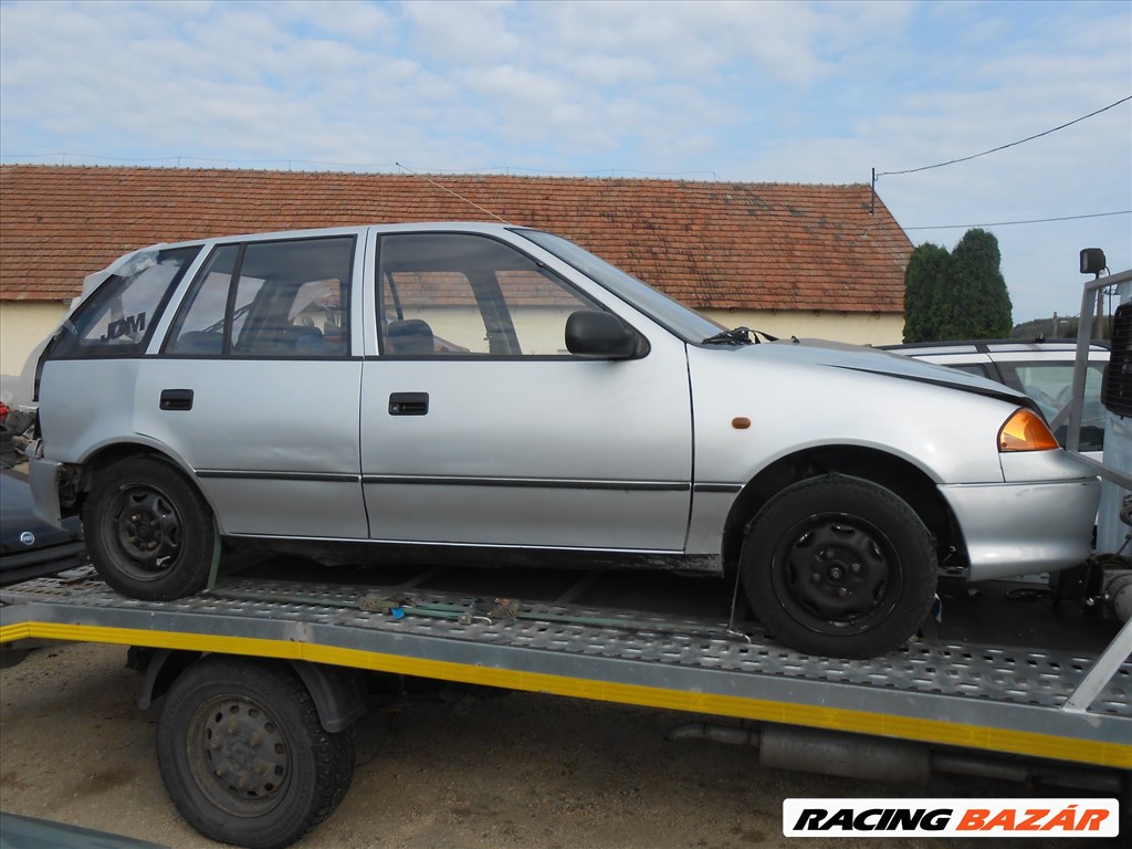 Suzuki SWIFT II Ferdehátú (EA_MA) 1.0 i jobb hátsó külső kilincs 4. kép