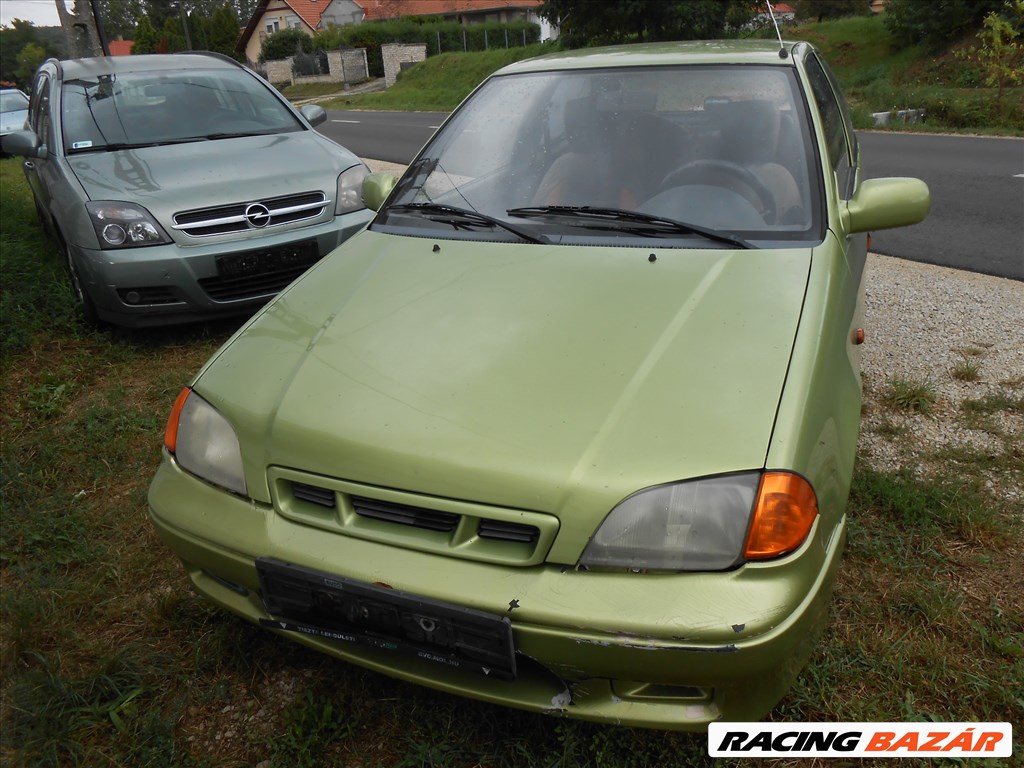 SUZUKI SWIFT II FERDEHÁTÚ (EA_MA) 1.0 jobb első ablakemelő kapcsoló 3. kép