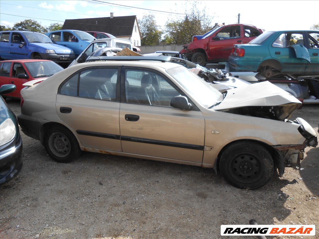 Hyundai ACCENT II LÉPCSŐS HÁTÚ (LC) 1.3 bal első ajtó 1. kép