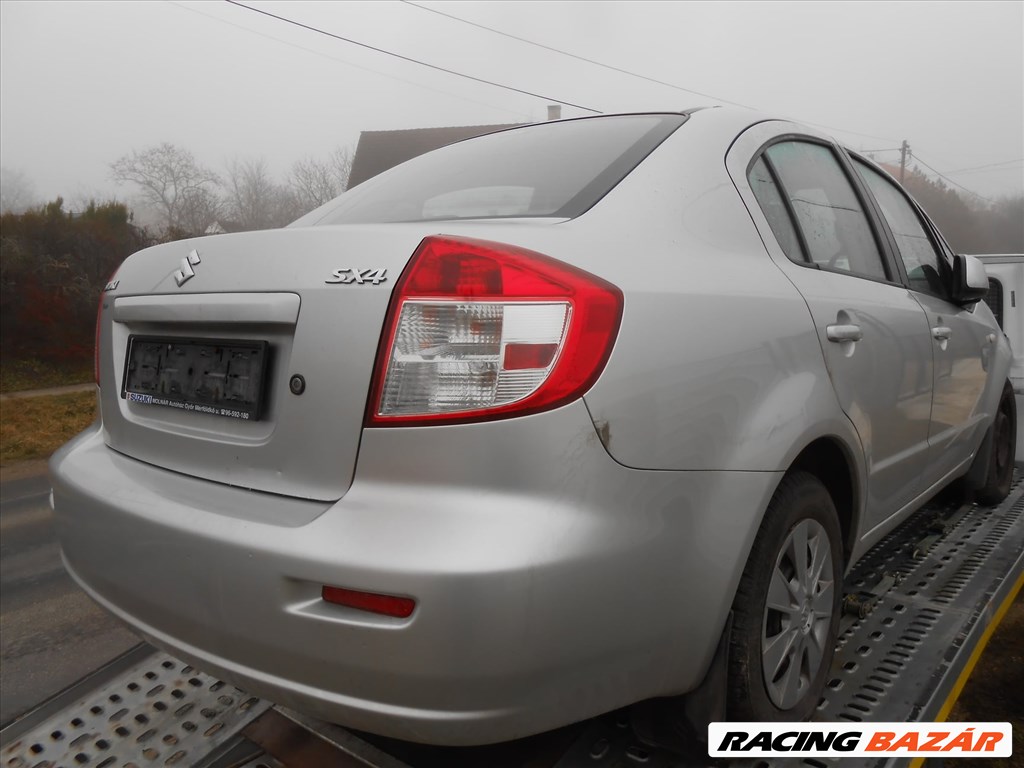 Suzuki SX4 lépcsőshátú (GY) 1.6 bal hátsó ablakemelő motor 1. kép