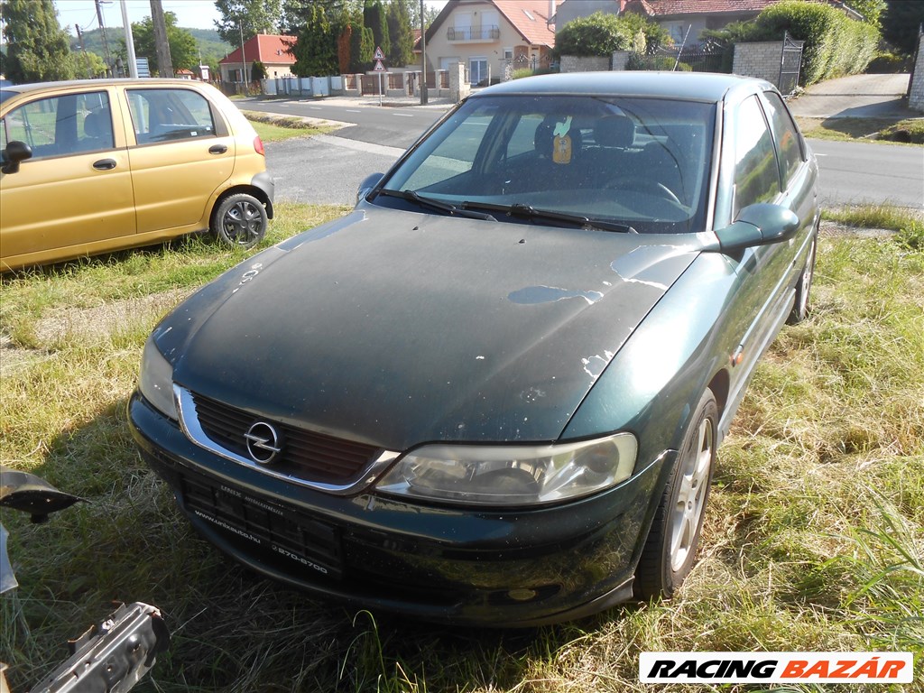 Opel VECTRA B Ferdehátú (J96) bal napellenző tartó 1. kép