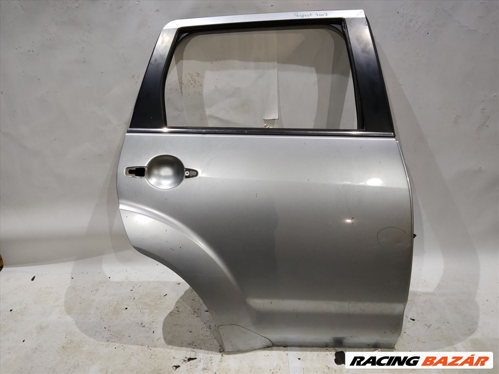 171000 Peugeot 4007 2007-2012 jobb hátsó ezüst színű ajtó, a képen látható sérüléssel 1. kép