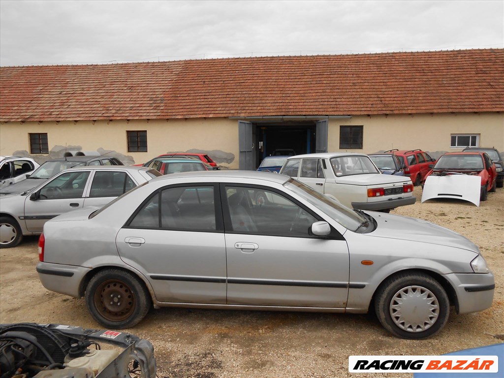 Mazda 323 S VI (BJ) 2.0 TD jobb első zárszerkezet 2. kép