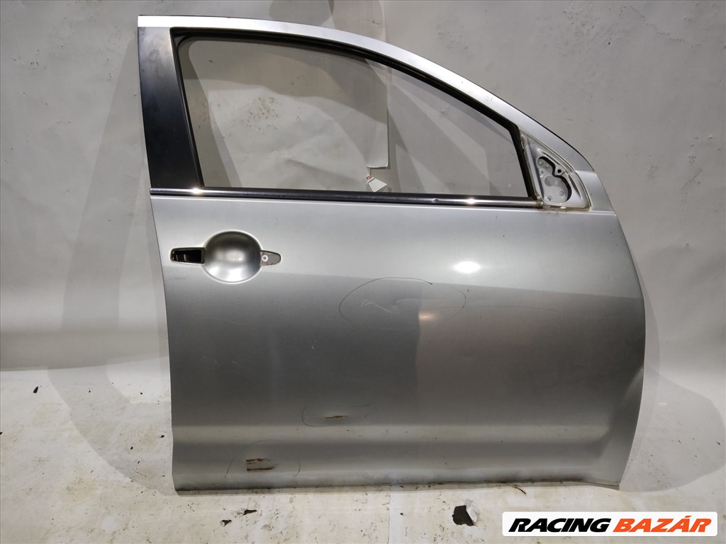 170992 Peugeot 4007 2007-2012 ezüst színű jobb első ajtó, a képen látható sérüléssel 1. kép