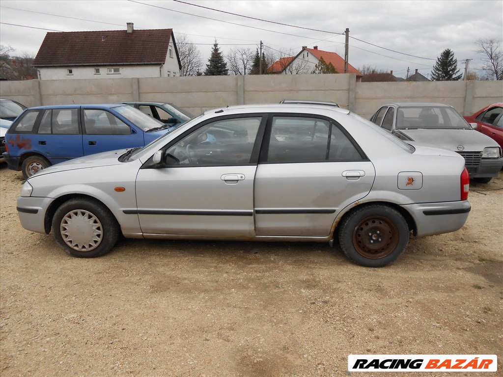 Mazda 323 S VI (BJ) 2.0 TD bal hátsó zárszerkezet 5. kép